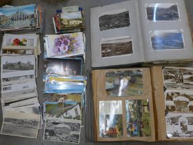 A collection of postcards, all 20th Century onwards including two albums and other loose cards and
