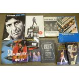 Eleven music books including Bob Dylan, Queen, The Beatles, etc.