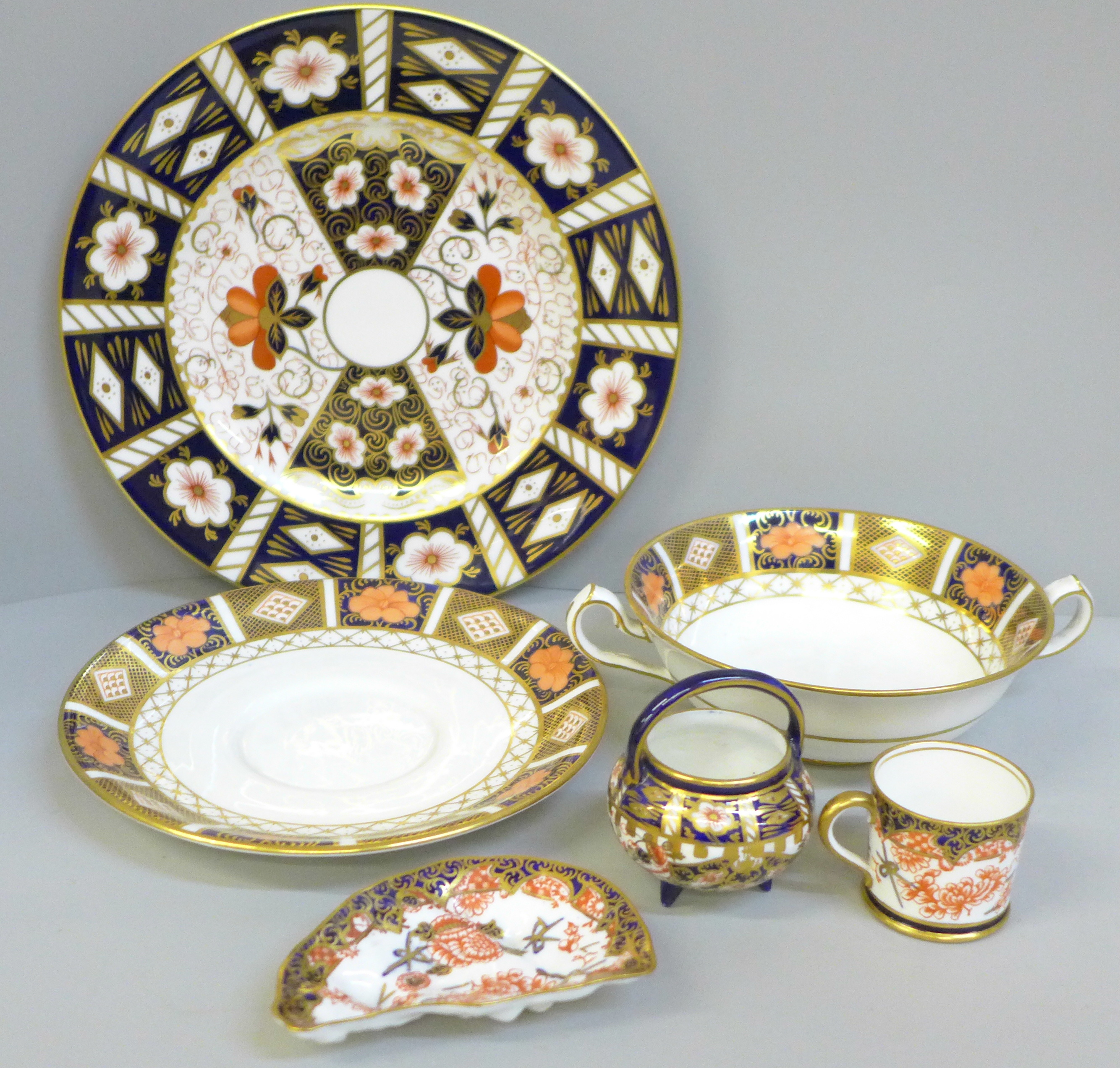 A Royal Crown Derby soup bowl and saucer, 2451 pattern side plate, pin dish, miniature mug and