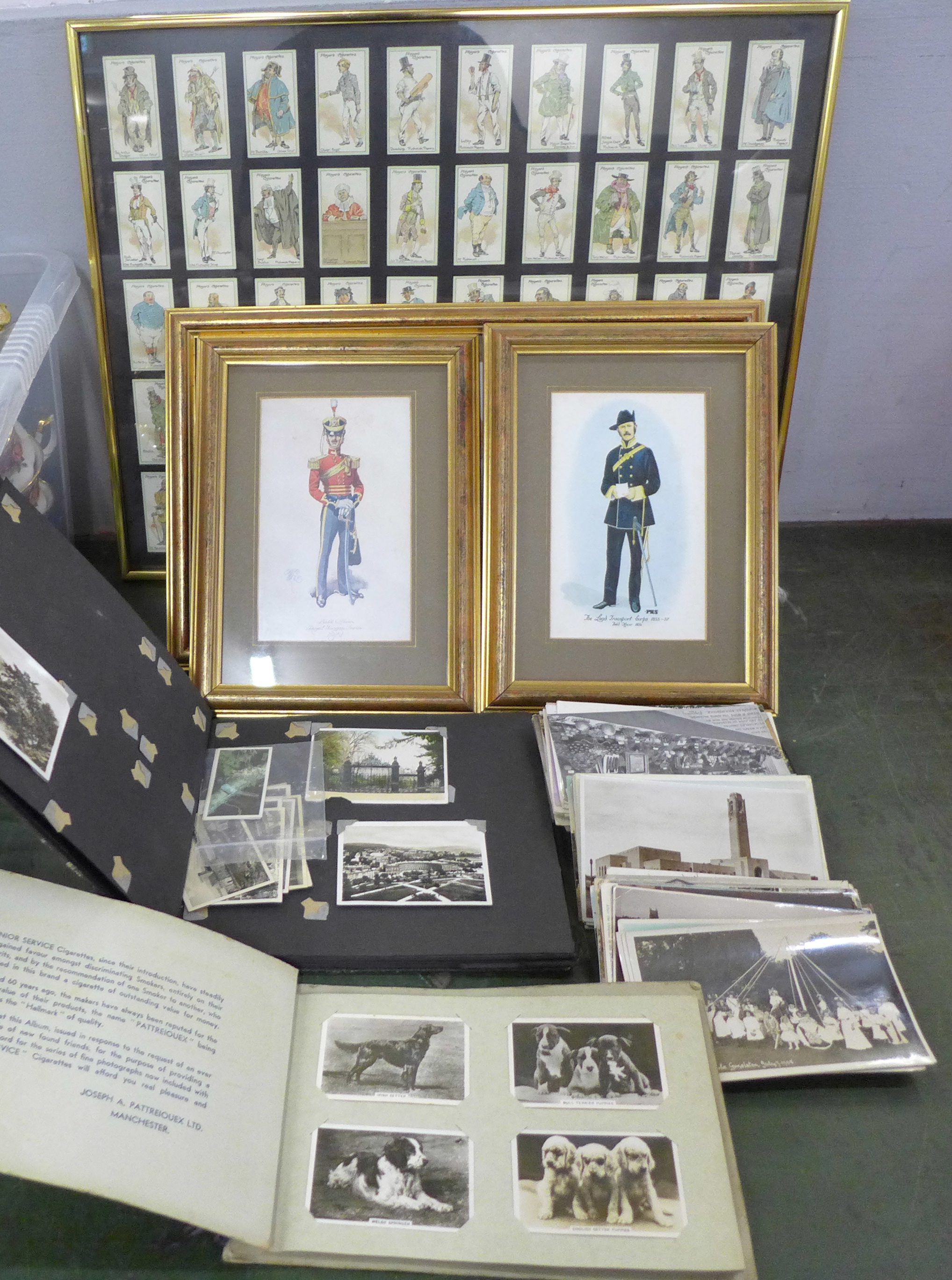 A box of mixed postcards, two albums of cigarette cards and photographs, framed prints of soldiers