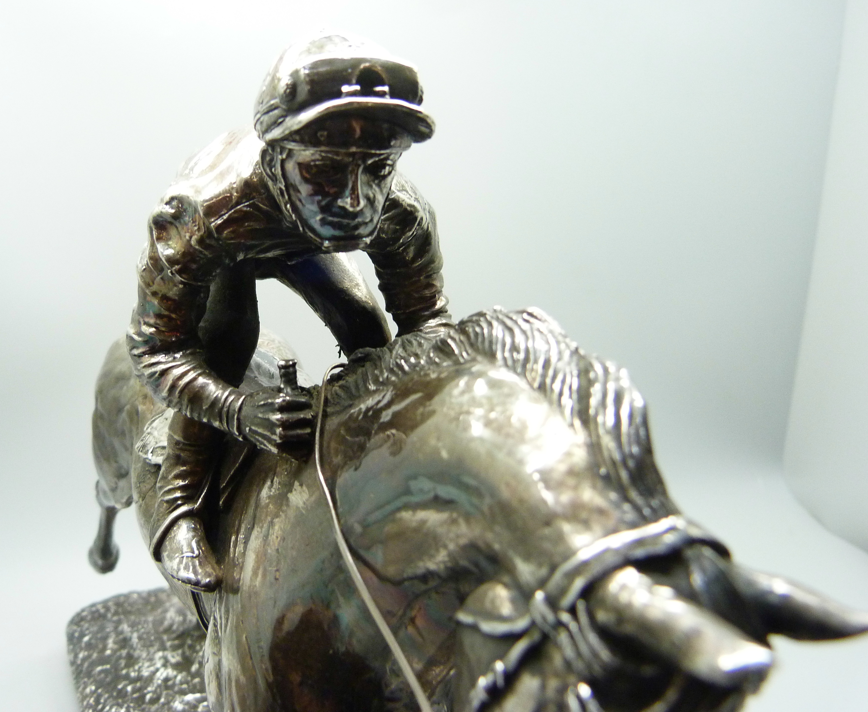 A hallmarked silver model of a racehorse and jockey, resin filled, Sheffield 1997, base 26.5cm x 6. - Image 3 of 6