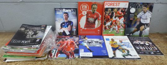 A collection of Nottingham Forest and Derby County football programmes