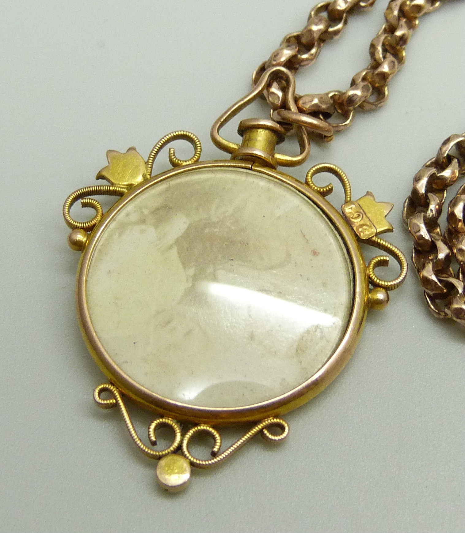 A Victorian 9ct gold photograph pendant set with turquoise and seed pearls with 9ct plaque verso, - Image 4 of 4