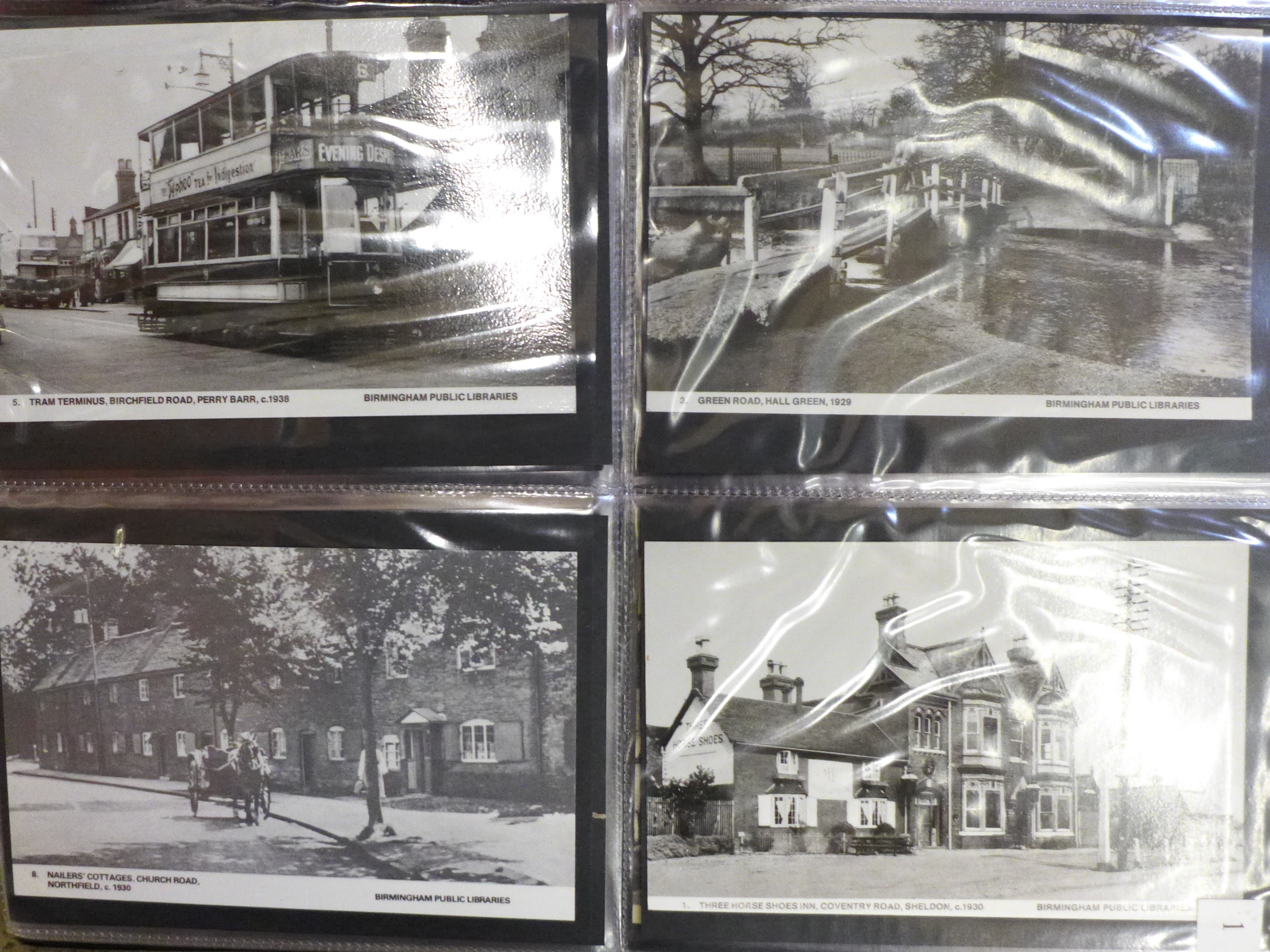 A large postcard collection album of approximately 175 mainly real photograph postcards covering