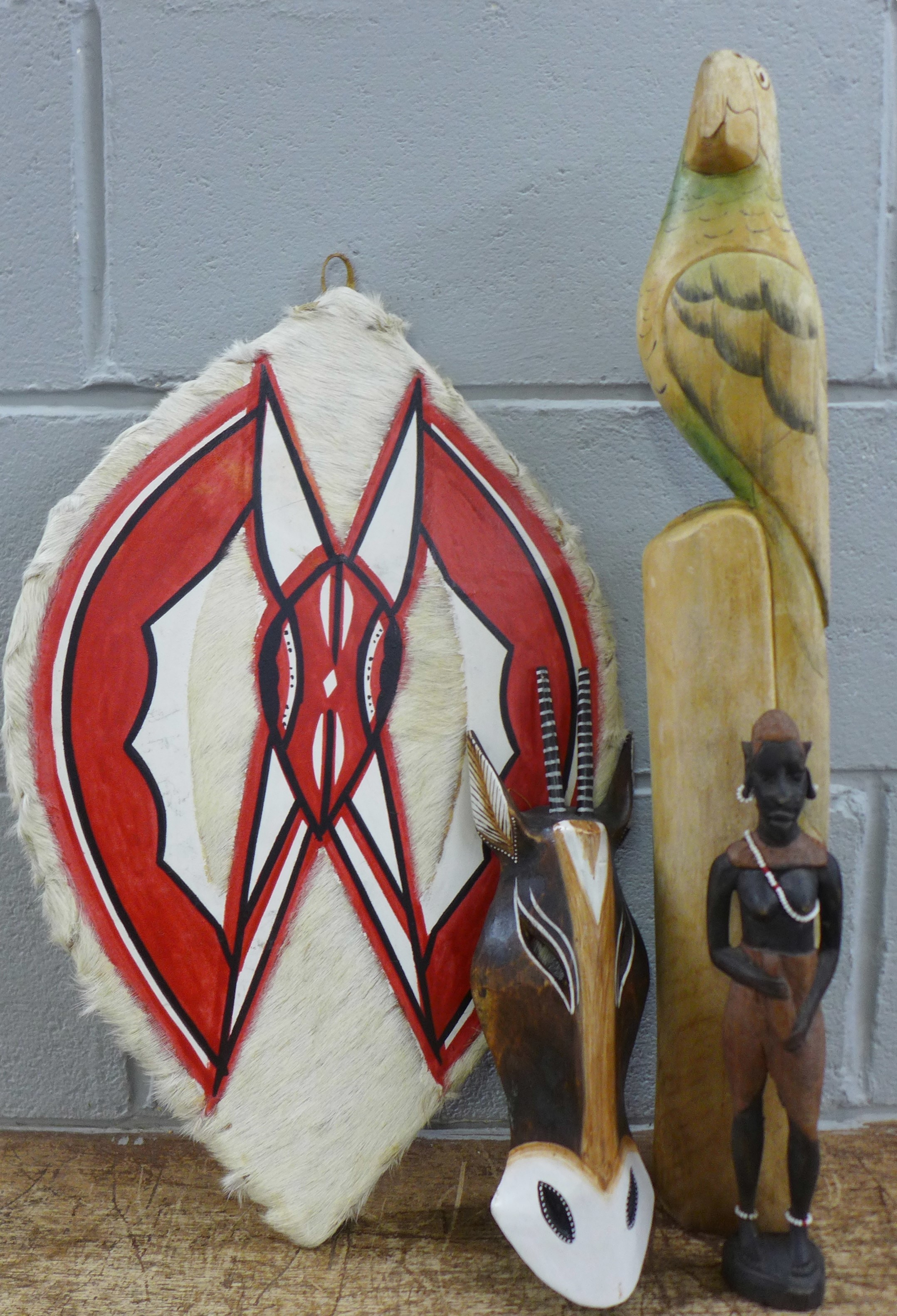 A collection of Maasai shields, spears, spear heads and wooden carvings, tallest spear 187cm - Image 3 of 9