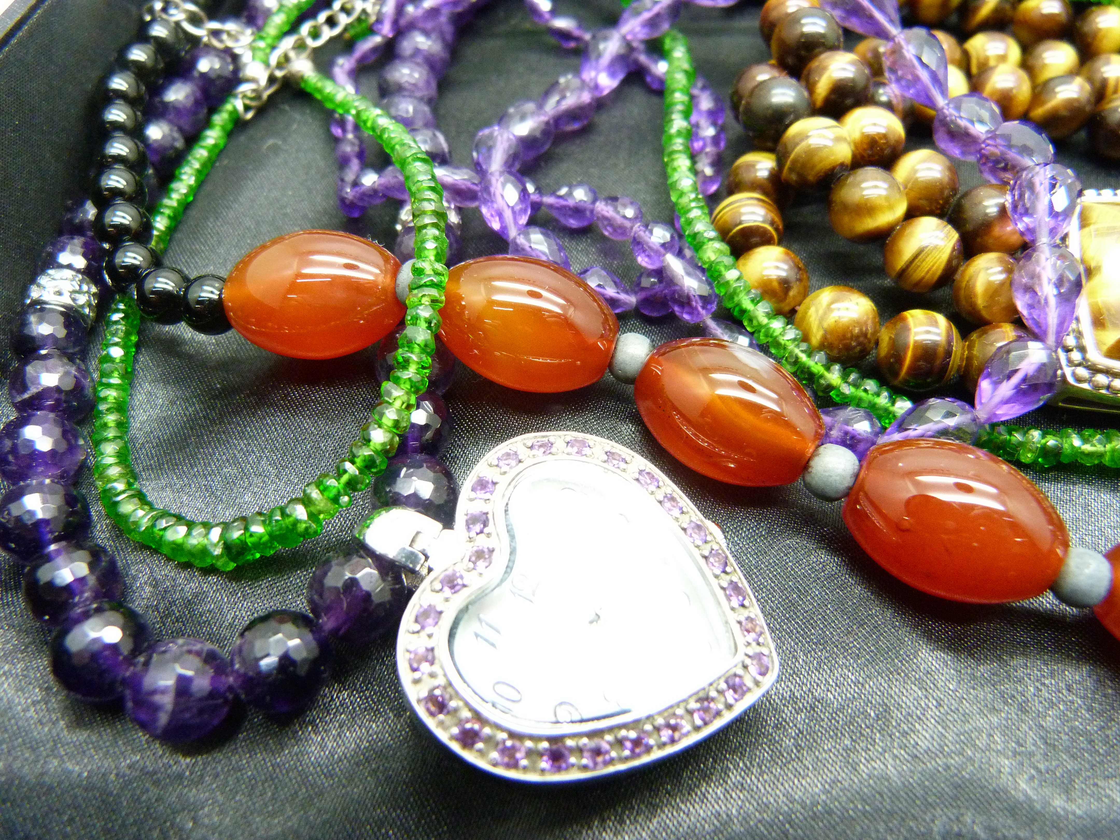 A silver and tiger's eye bracelet, a silver watch on a silver mounted amethyst chain, three other - Image 3 of 3