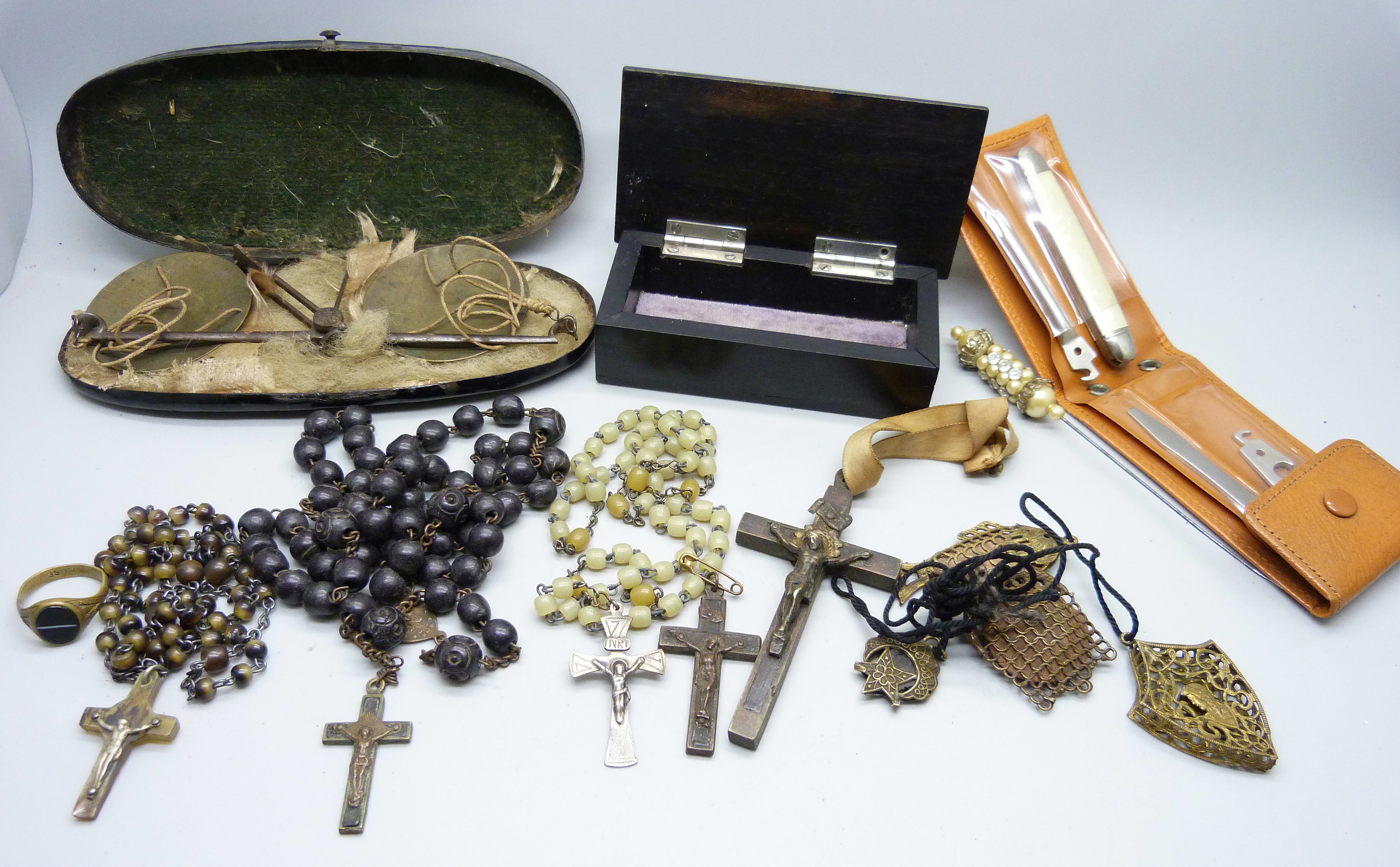 A wooden box, a collection of rosary beads including one with .800 silver cross and other items