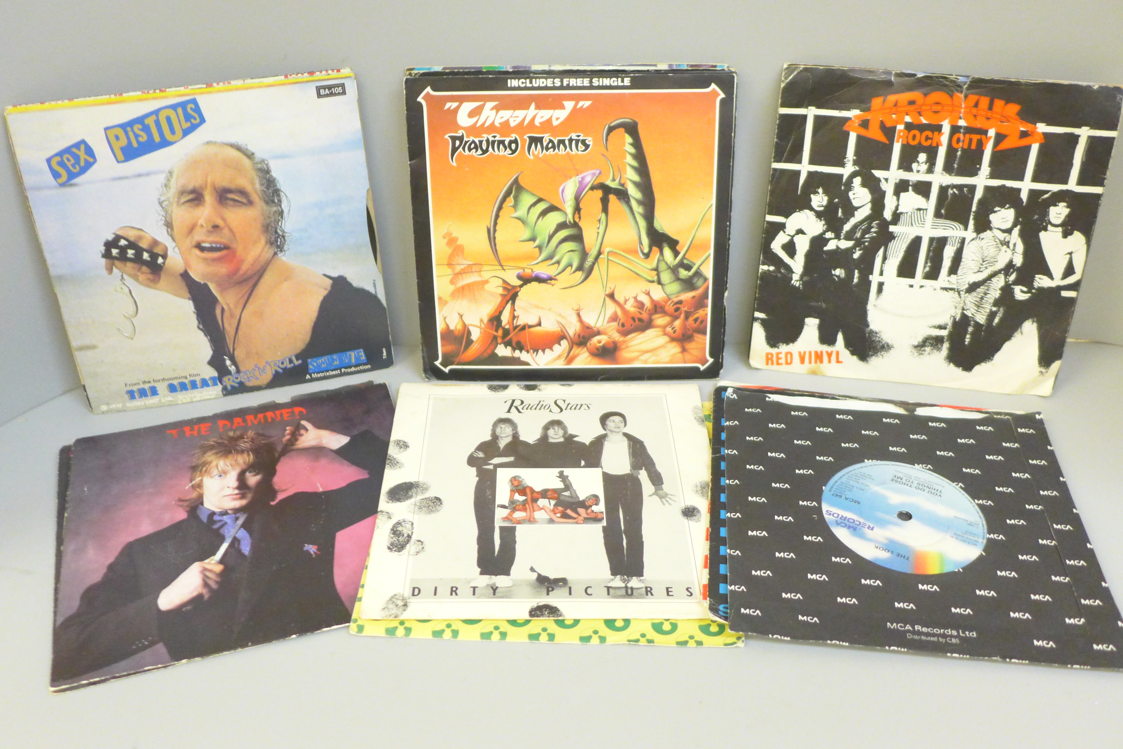 Twenty-seven vinyl 7" singles including Sex Pistols, The Damned, Banned, The Stranglers