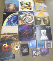 A collection of eleven Moody Blues LP records, a 12" single, 7" single, CDs, DVD and tour programme