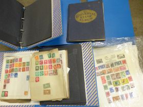A collection of stamp sheets and albums, and four new stamp collecting folders (hold 500 stamps