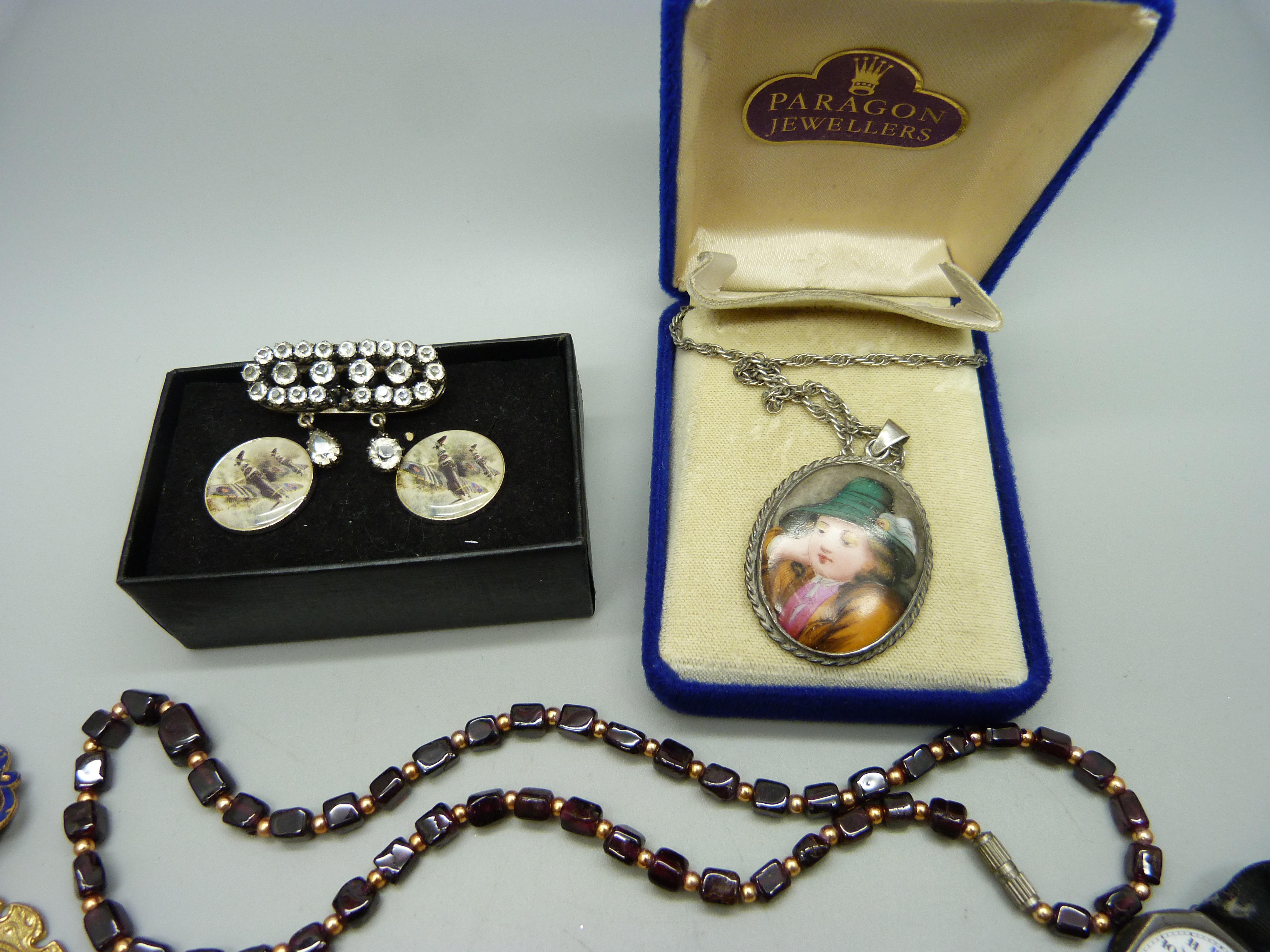 A garnet necklace, a pair of silver cufflinks, a silver cased wristwatch, a silver fox bar brooch, - Image 4 of 4