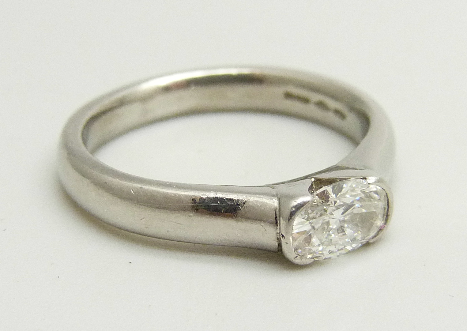 A platinum and diamond solitaire ring, approximately 0.5ct diamond weight, 6.7g, M - Image 3 of 4