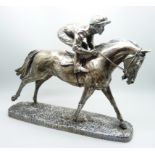 A hallmarked silver model of a racehorse and jockey, resin filled, Sheffield 1997, base 26.5cm x 6.