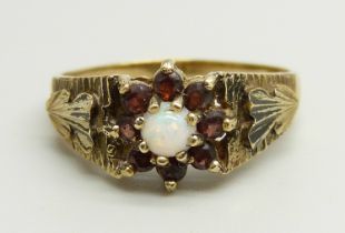 A 9ct gold, garnet and opal cluster ring, 3.2g, R