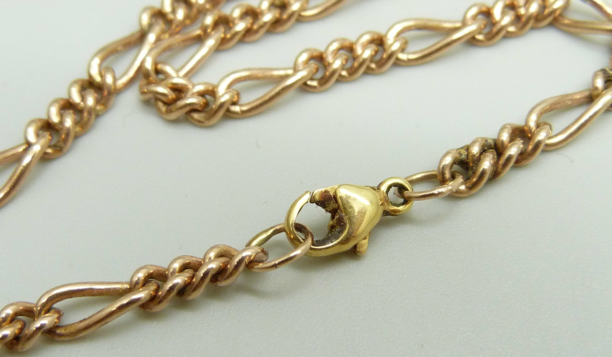 A yellow metal figaro chain necklace, approximately 46.5cm, chain is rose gold with a replacement - Image 2 of 2