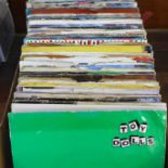 A box of 1970s/1980s 7" singles; rock, new wave, pop, etc.