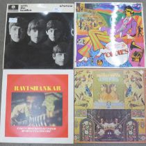 Two The Beatles and two Ravi Shankar LP records including with the Beatles