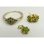 A 9ct gold and green diamond cluster ring, 2.5g, U, and a pair of silver gilt earrings and