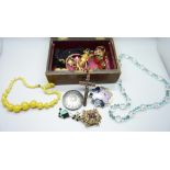 Vintage costume jewellery in a jewellery box