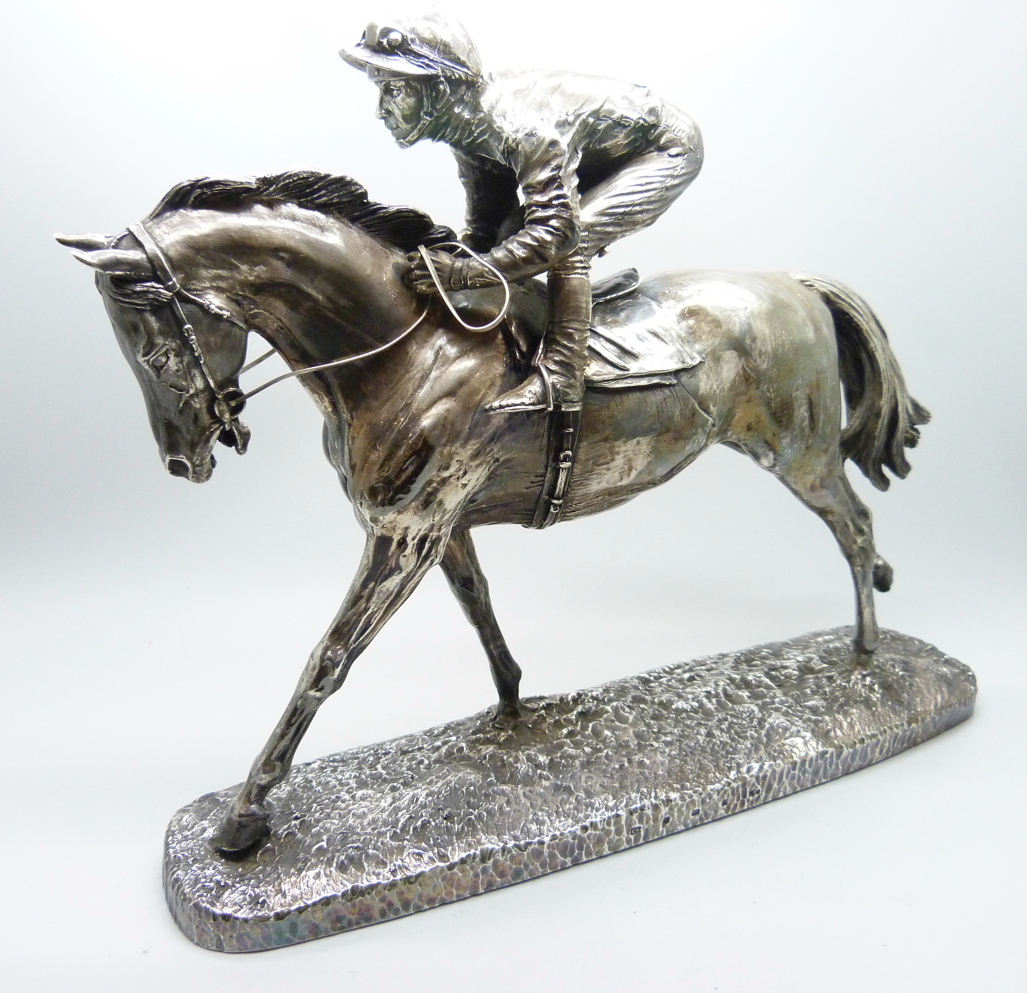 A hallmarked silver model of a racehorse and jockey, resin filled, Sheffield 1997, base 26.5cm x 6. - Image 2 of 6