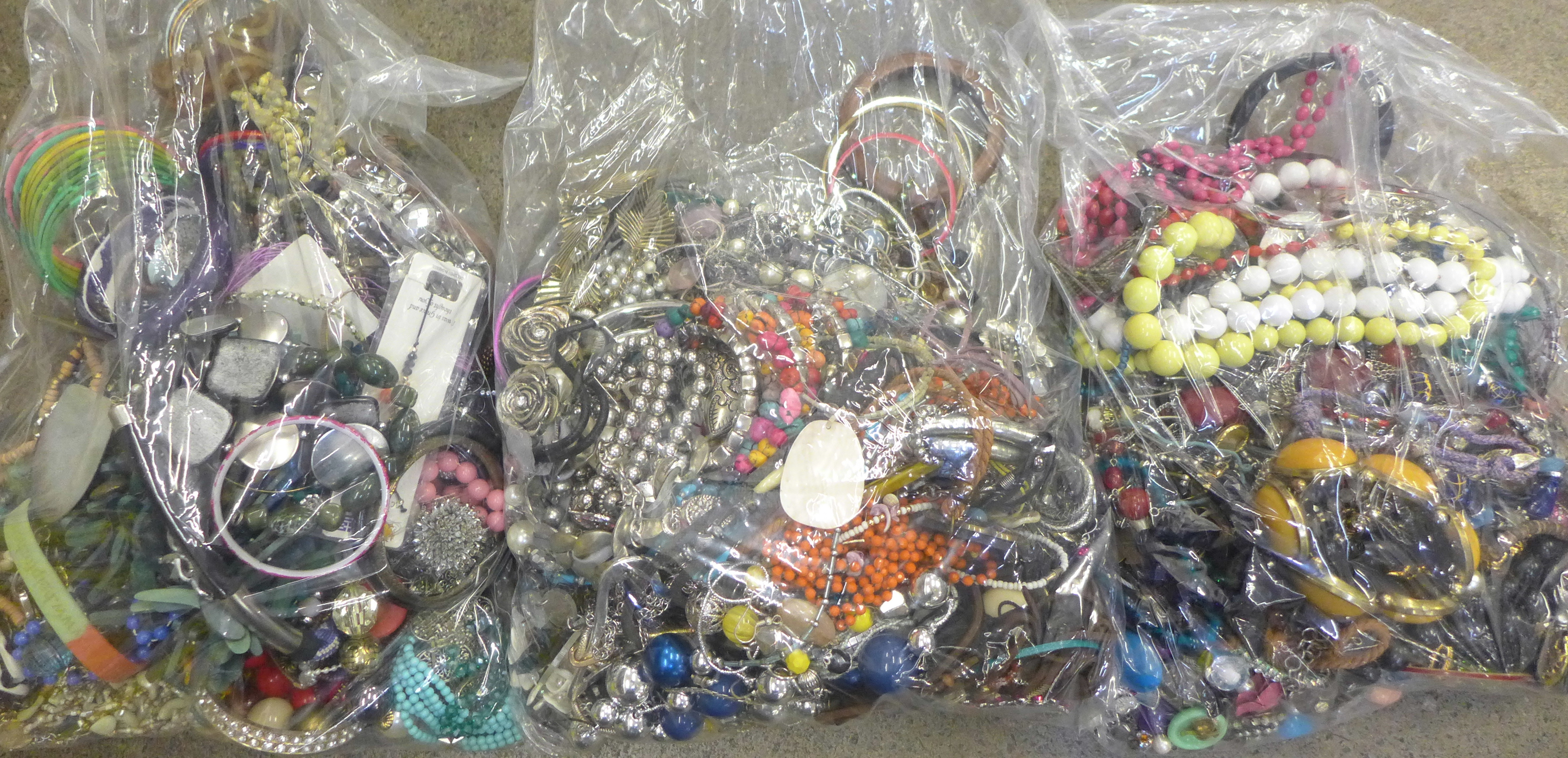 Three large bags of costume jewellery