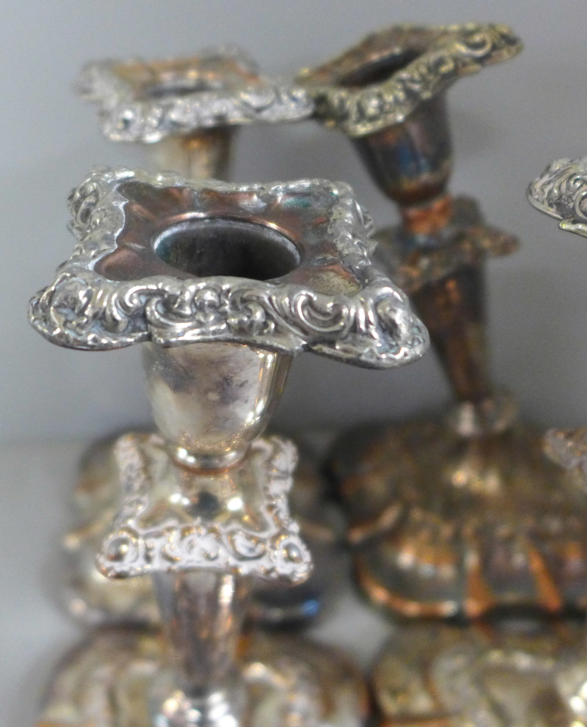 A silver plate on copper tall candelabra with two pairs of candlesticks, one a/f and a set of six - Image 6 of 11