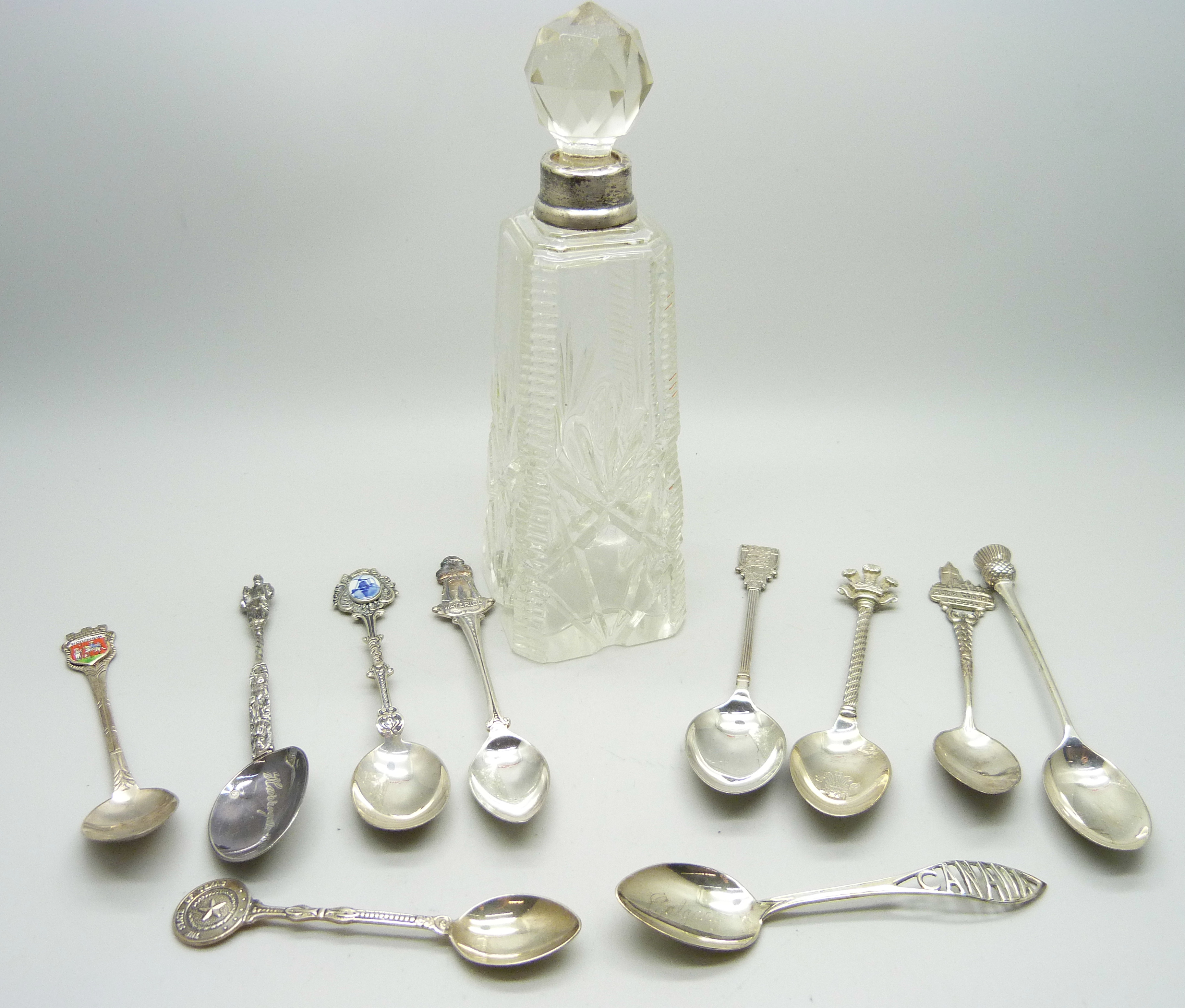 A collection of silver spoons, three with British hallmarks, 34g and other continental examples