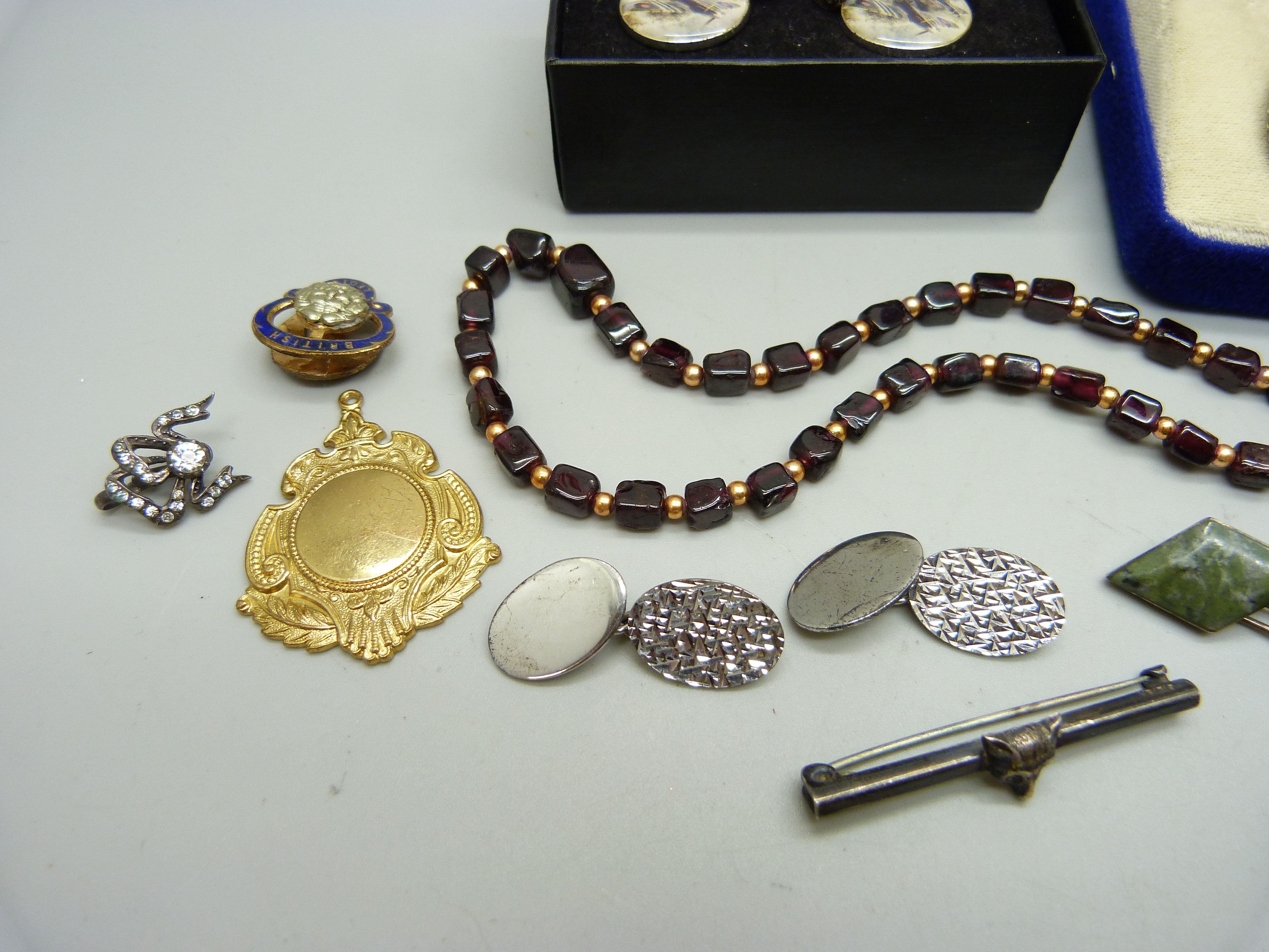 A garnet necklace, a pair of silver cufflinks, a silver cased wristwatch, a silver fox bar brooch, - Image 2 of 4