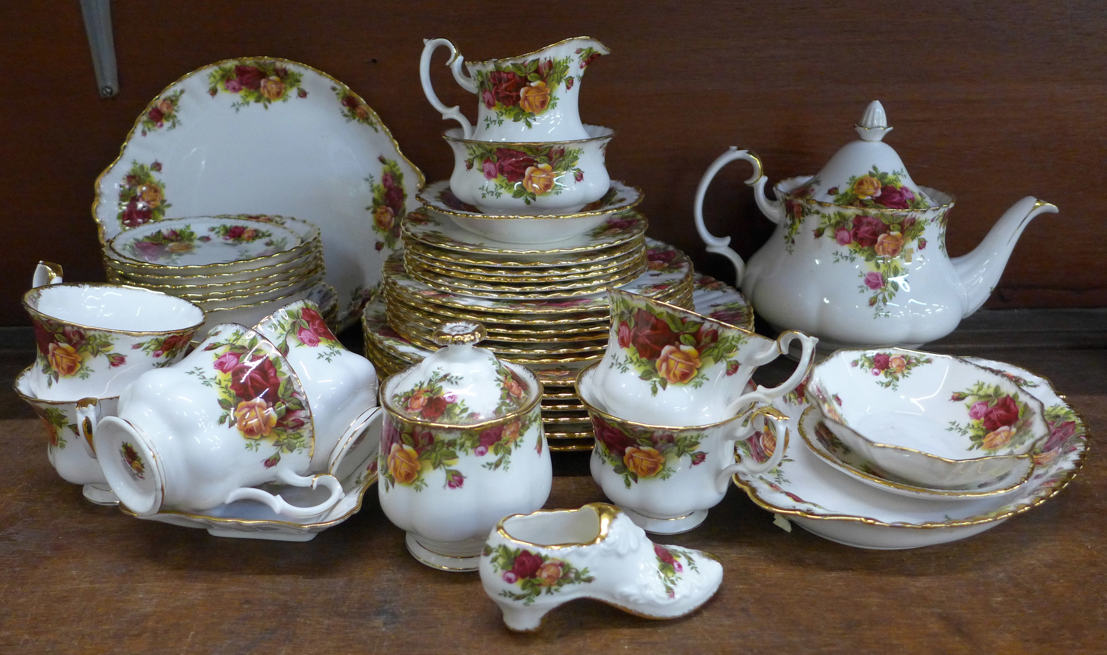 A Royal Albert Old Country Roses six setting tea and dinner service with dinner, side and tea