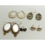 A pair of Suati silver and mother of pearl drop earrings, a pair of white metal stone set earrings