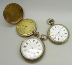 A gold plated full hunter pocket watch in an engine turned case (closure a/f), a .935 silver cased
