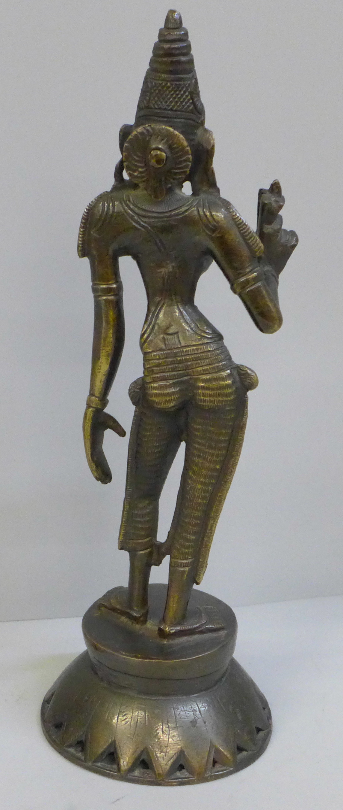 A bronze model of an Indian Goddess, Parvati Devi and a horn and rosewood model of a bird - Image 4 of 4