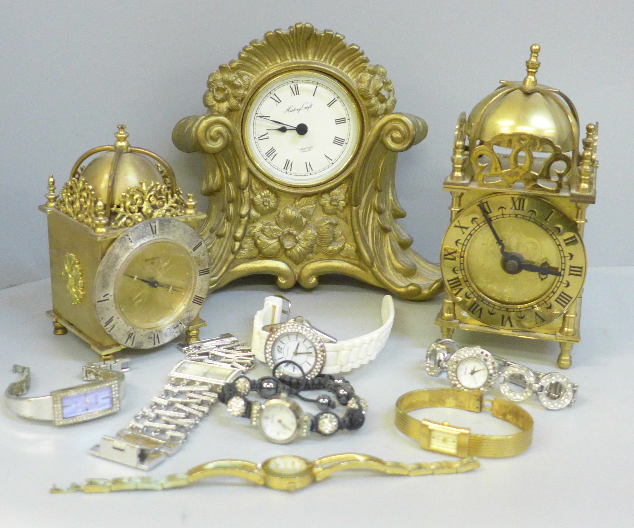 Three clocks including Swiss and a collection of wristwatches including DKNY (a/f missing stones)