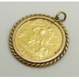 A 1982 half sovereign in a 9ct gold pendant mount, 5.2g