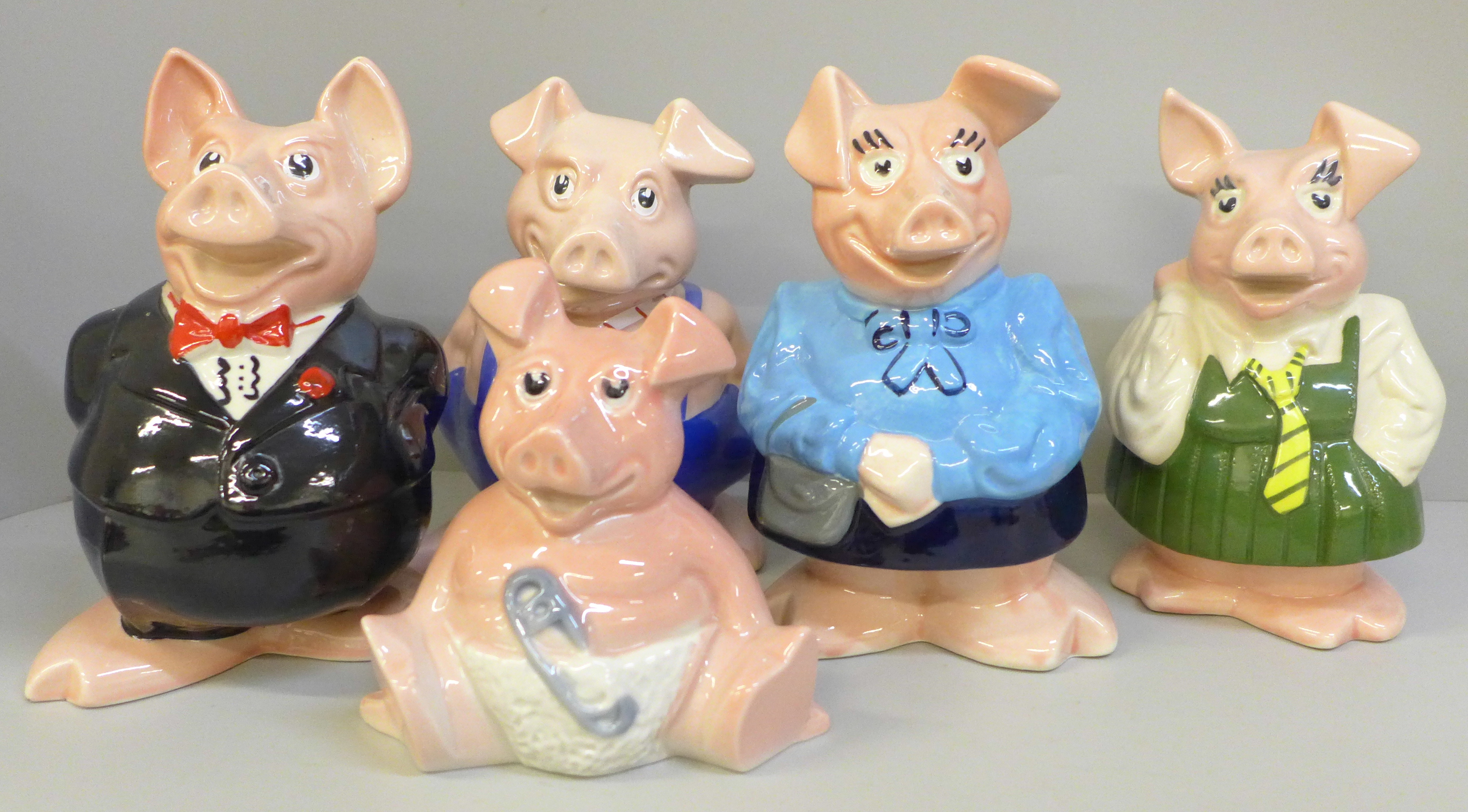 A set of five Wade Nat West piggy banks, all with stoppers