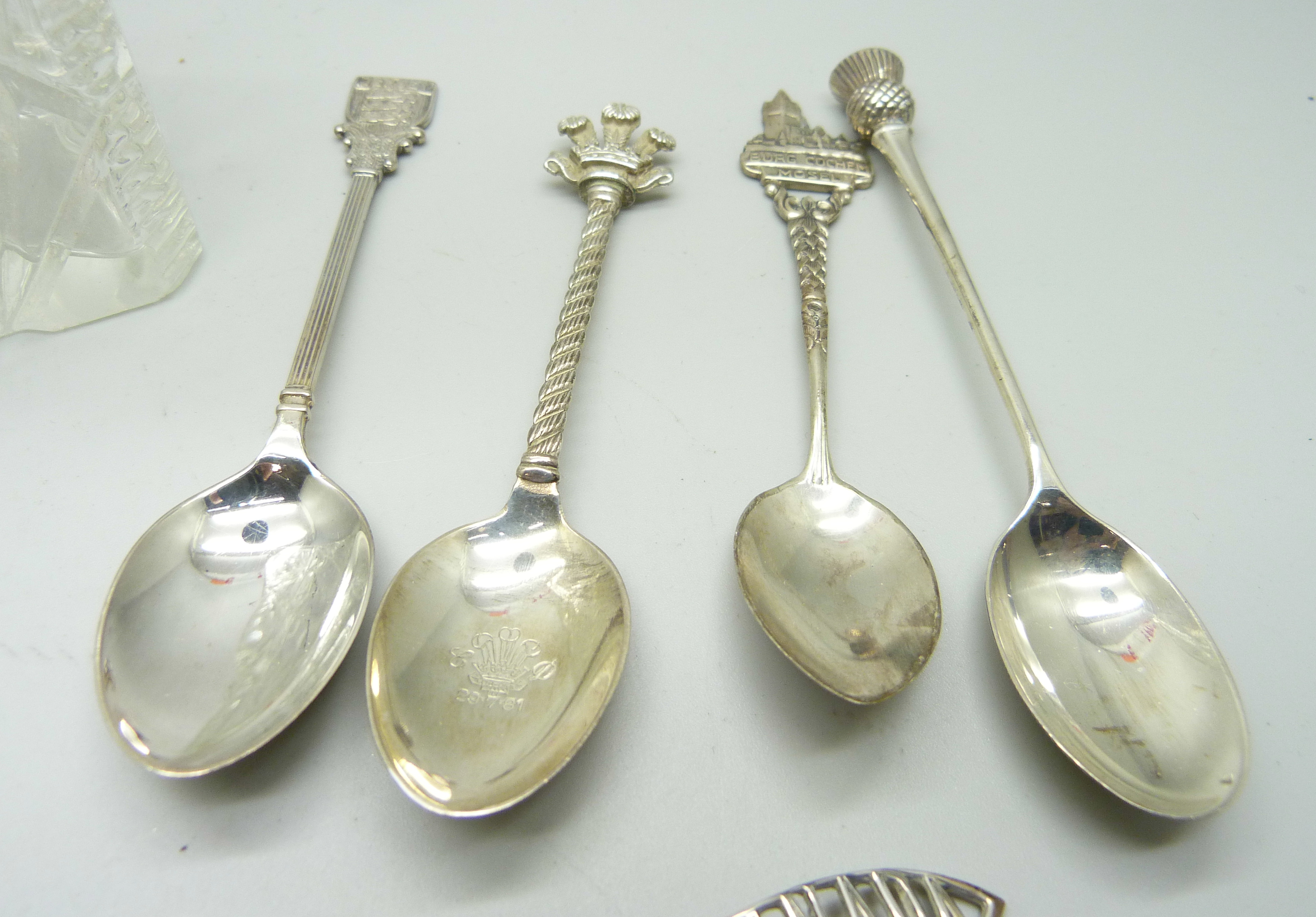 A collection of silver spoons, three with British hallmarks, 34g and other continental examples - Image 3 of 5