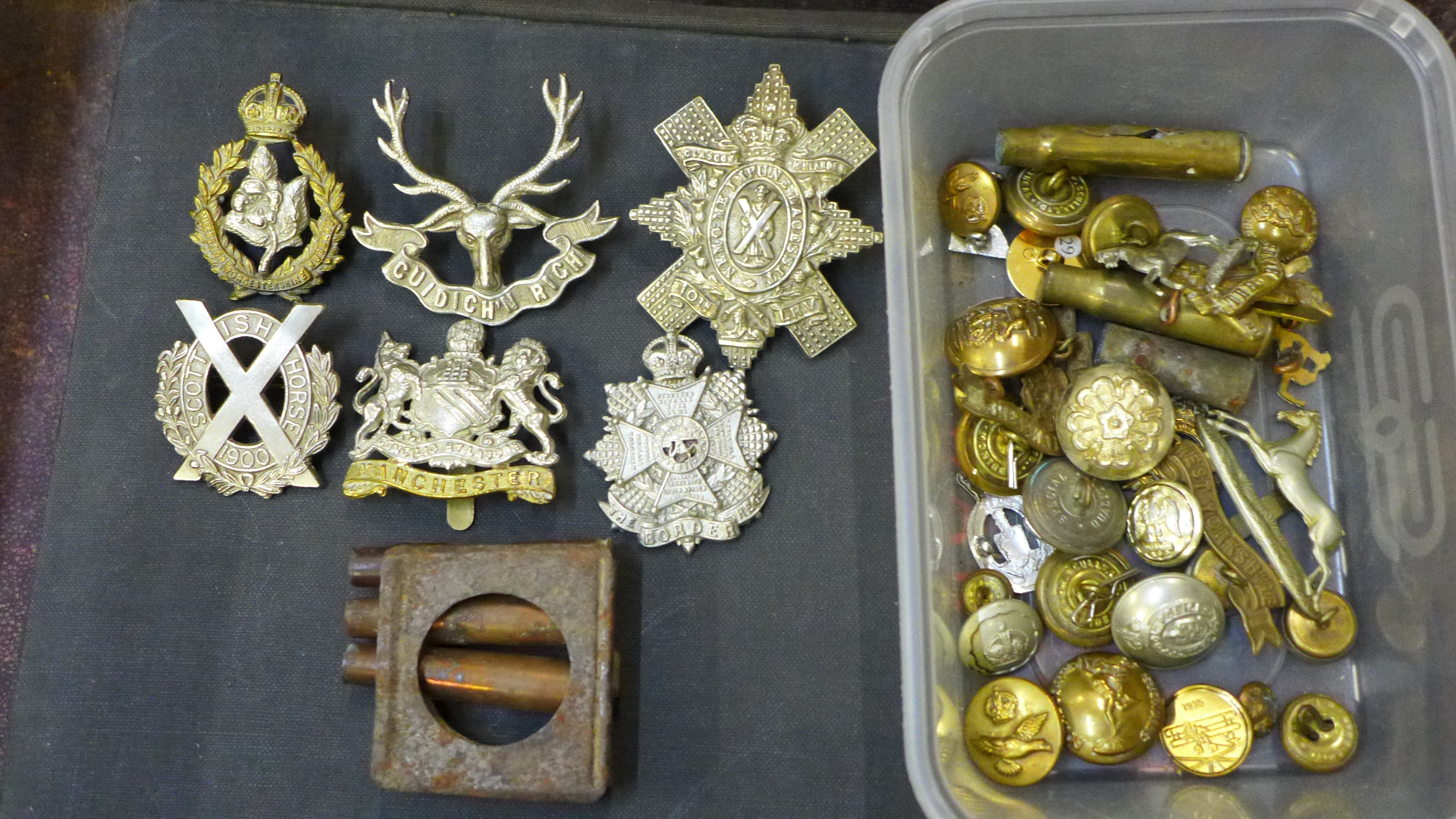 A suitcase containing military items from WWI onwards, assorted cap badges including Glasgow - Image 8 of 14