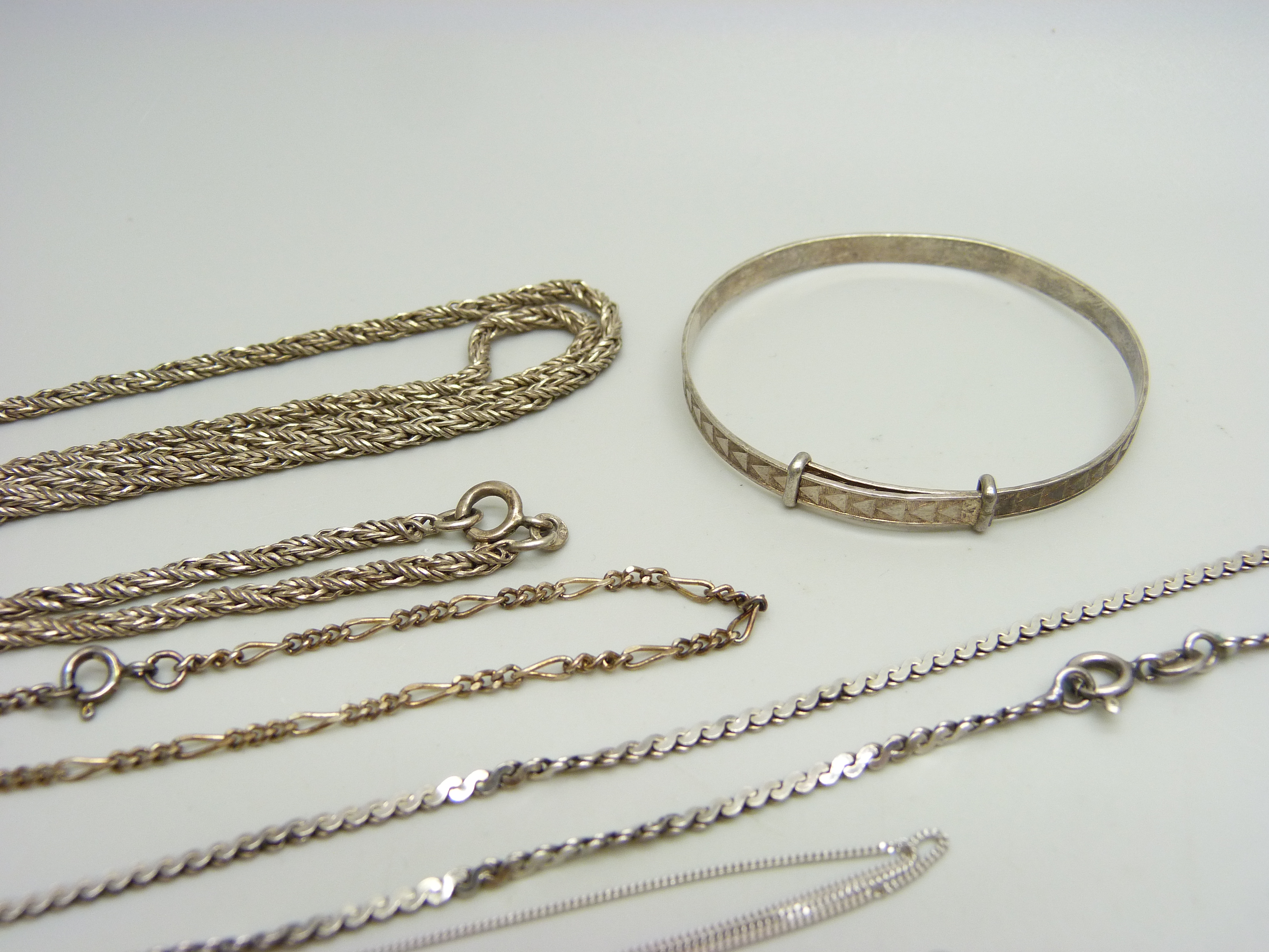 A collection of silver jewellery - a 24cm figaro bracelet, a child's bangle, a pendant and chain and - Image 2 of 2