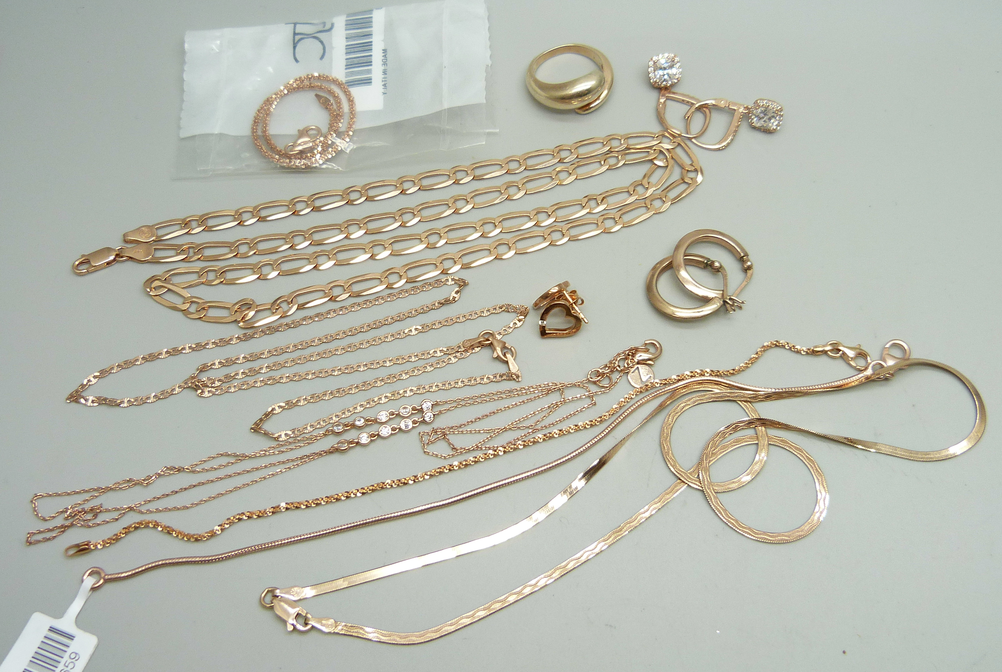 Rose gold gilt silver jewellery including a figaro chain necklace, mariner link necklace, flat snake