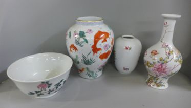 Three decorative vases and a fruit bowl, one Weimar Germany and Brooks and Bentley