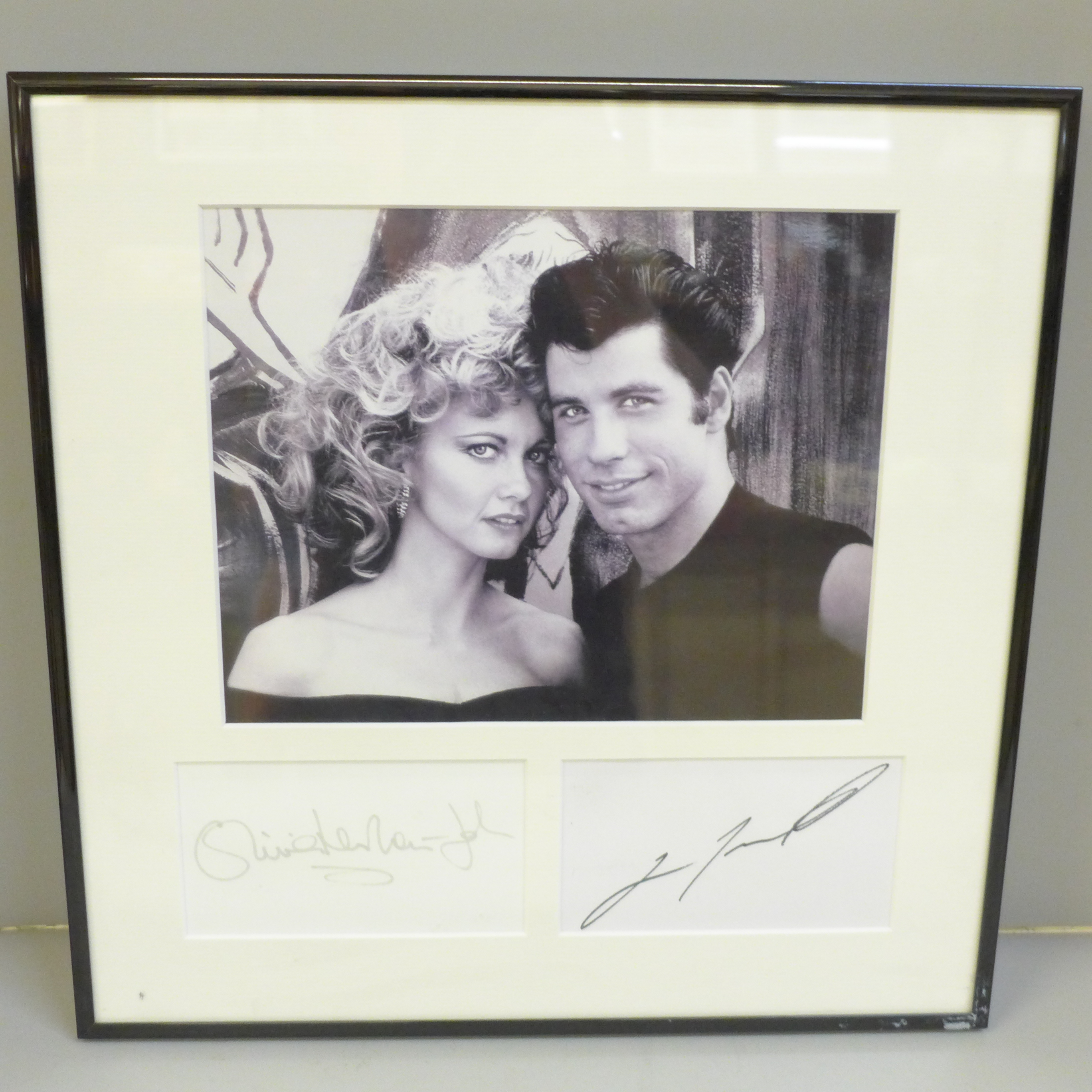 An Olivia Newton-John and John Travolta Grease autograph display Rutland Antiques AFTAL registered