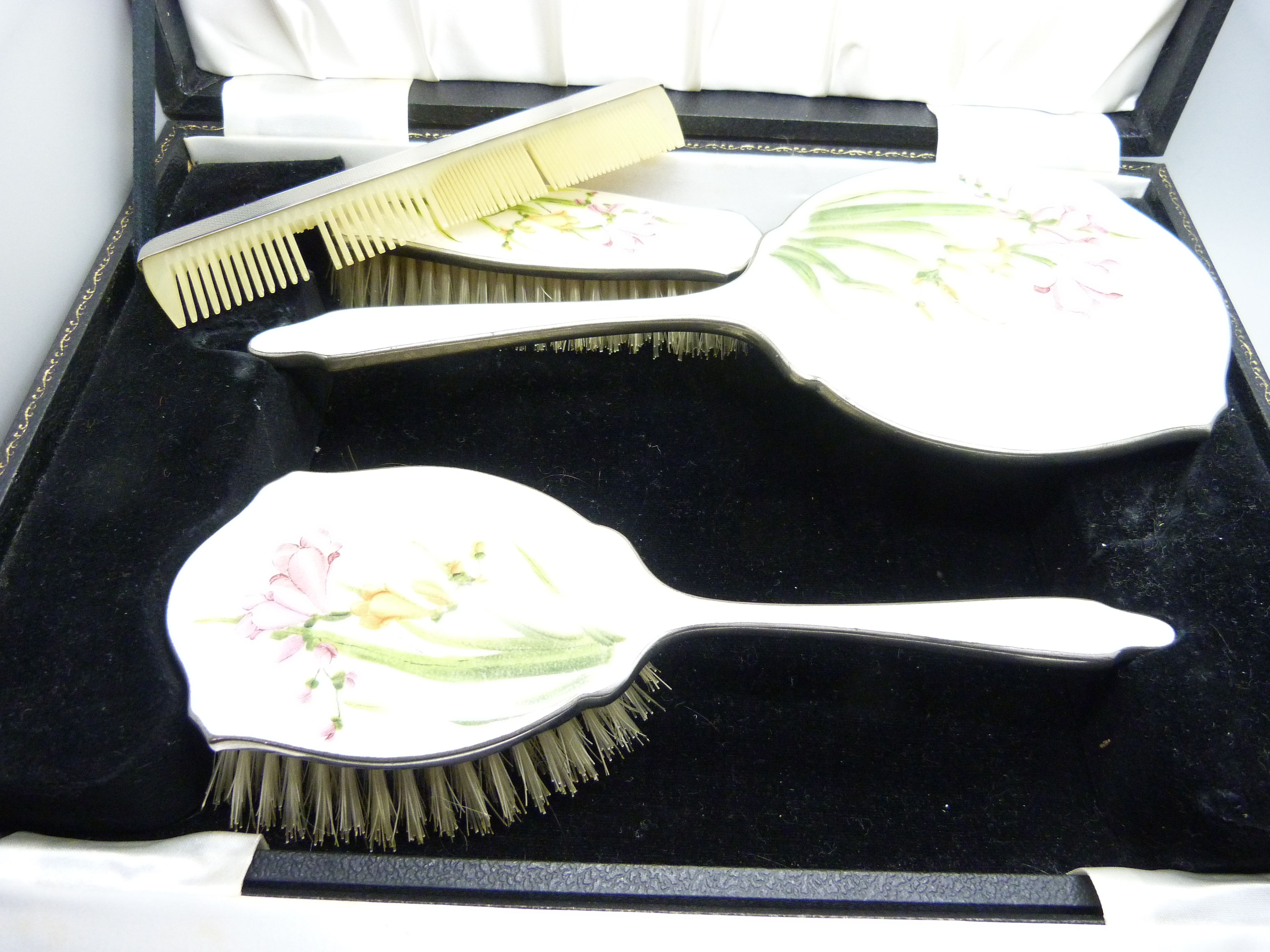 A cased silver plated dressing table set with floral design, cased, together with a silver - Image 4 of 5