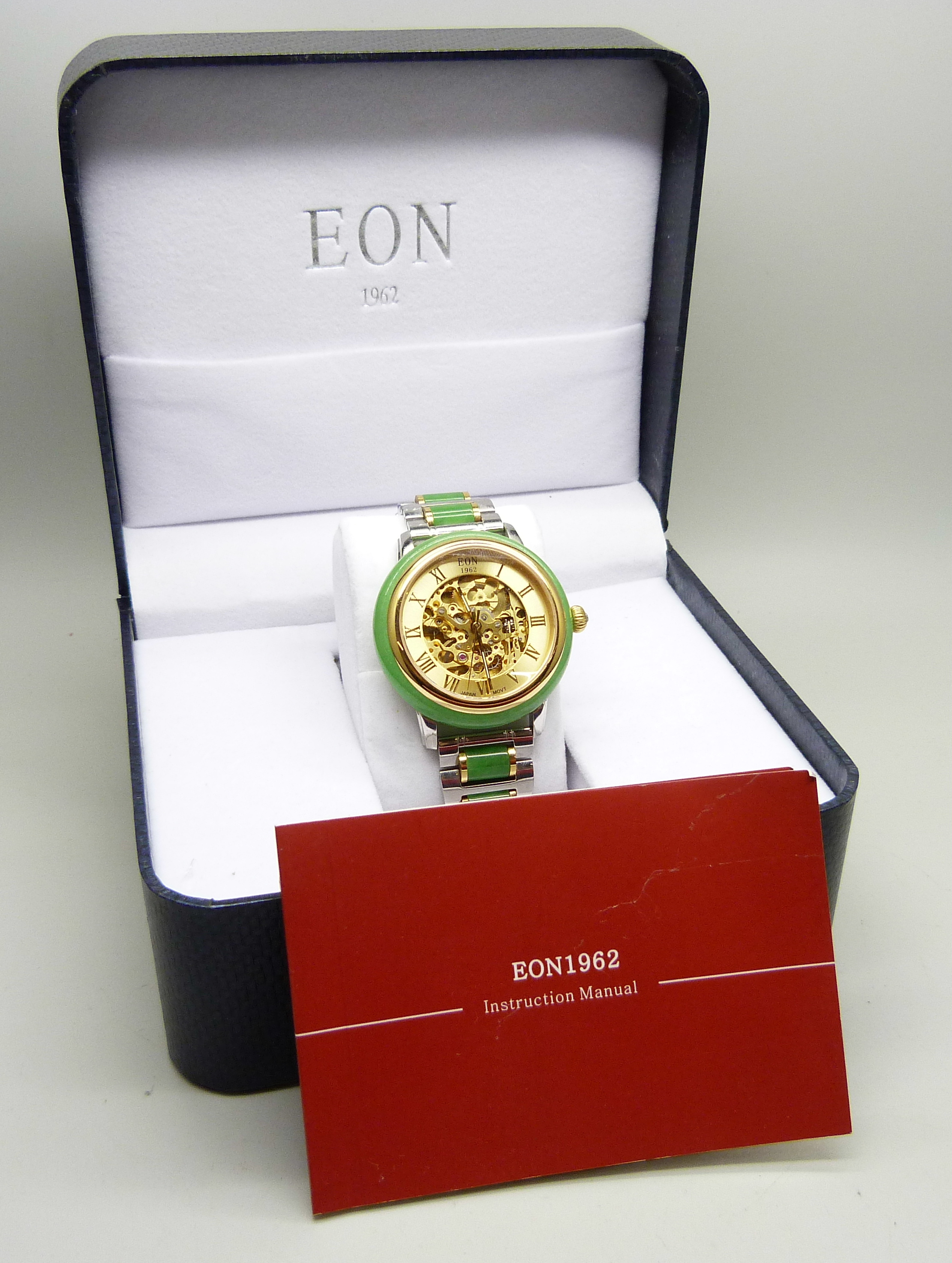 An Eon wristwatch with jade bezel and jade inset to bracelet strap, skeleton movement, 44mm