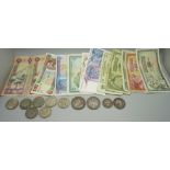 A collection of foreign bank notes, British and foreign coins including an 1889 crown and 1887