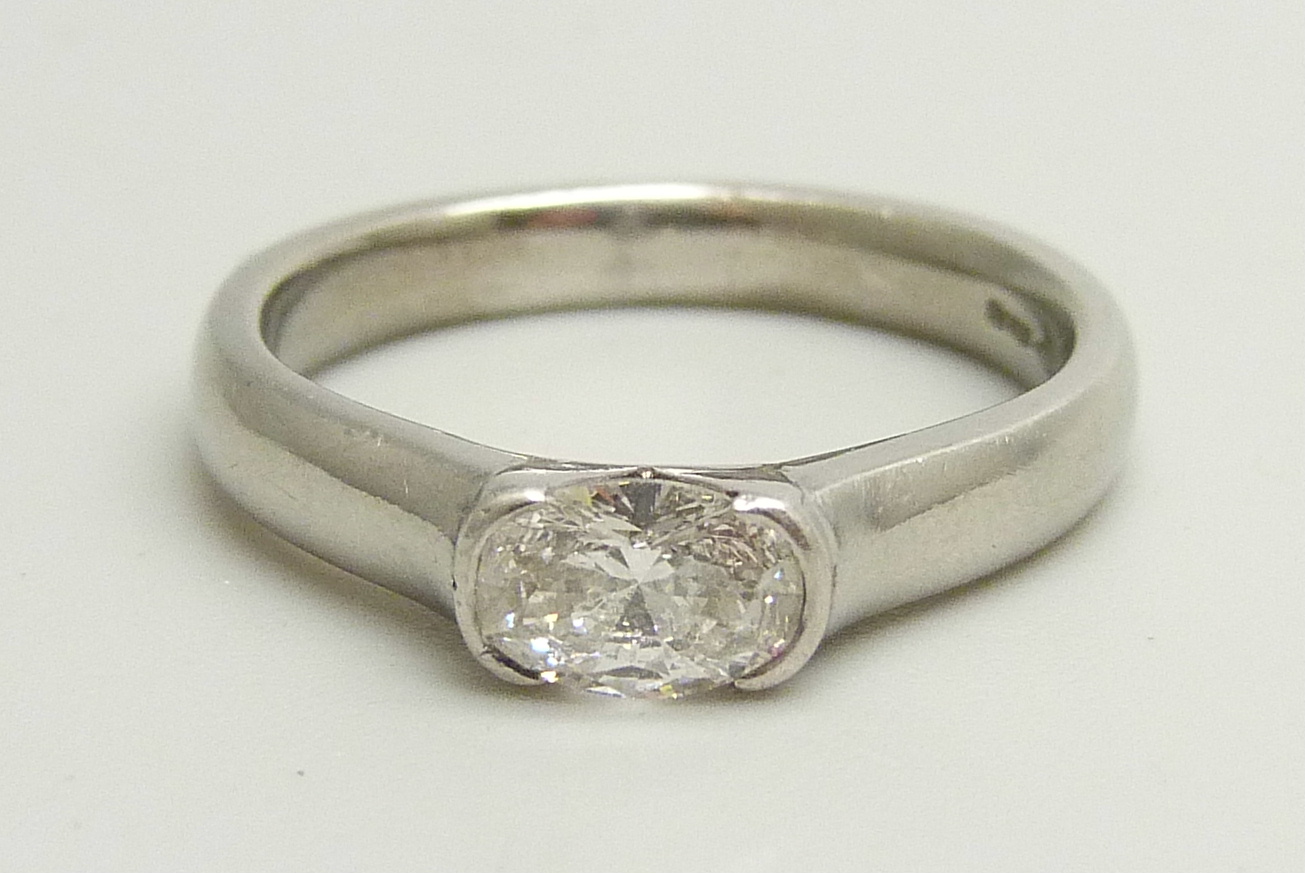 A platinum and diamond solitaire ring, approximately 0.5ct diamond weight, 6.7g, M