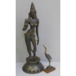 A bronze model of an Indian Goddess, Parvati Devi and a horn and rosewood model of a bird