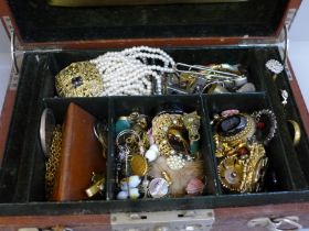 A leather case of costume jewellery