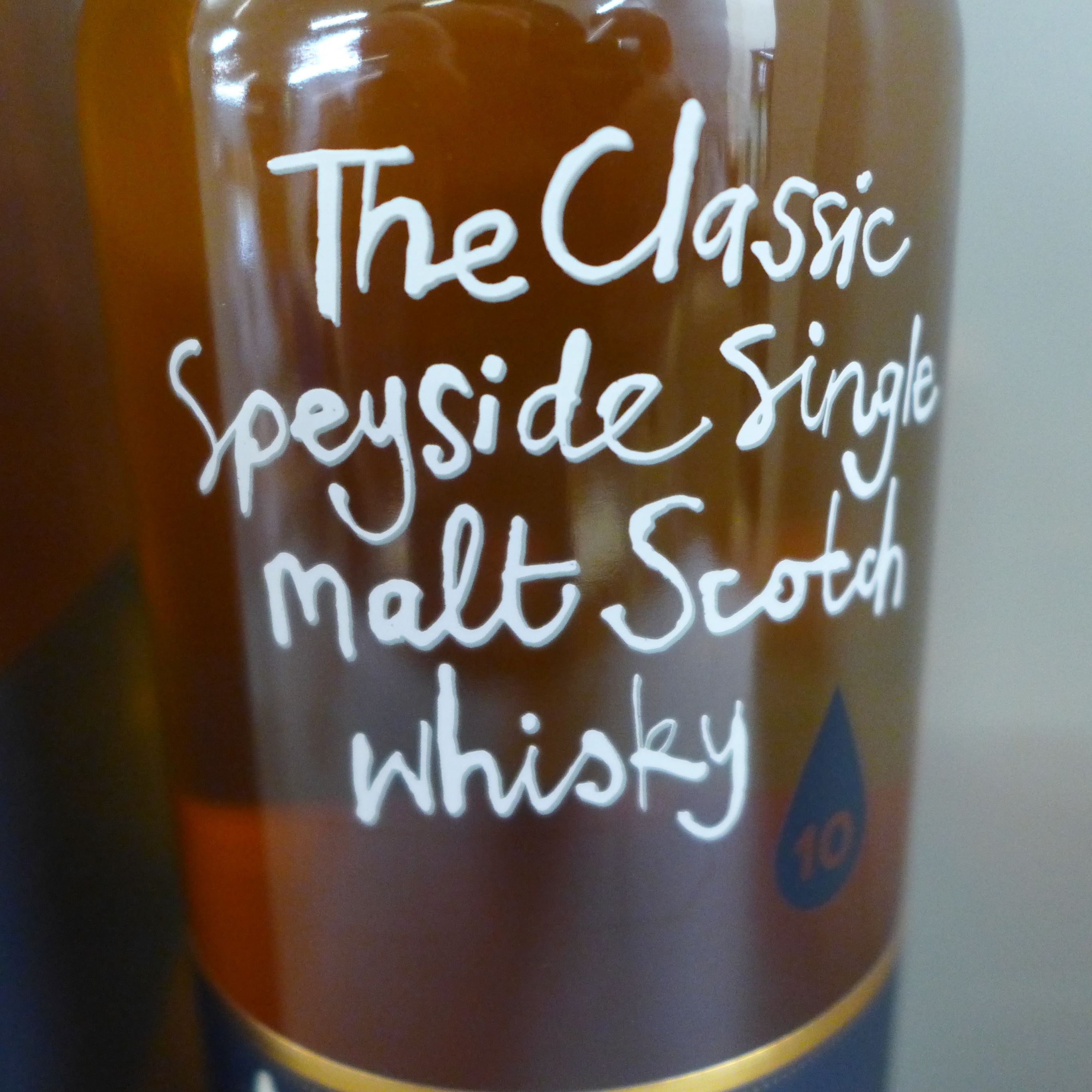 A bottle of Benromach Speyside Single Malt Scotch Whisky, 10 years old, boxed - Bild 3 aus 4