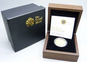 The Royal Mint, a George III gold Guinea 1788, boxed with certificate