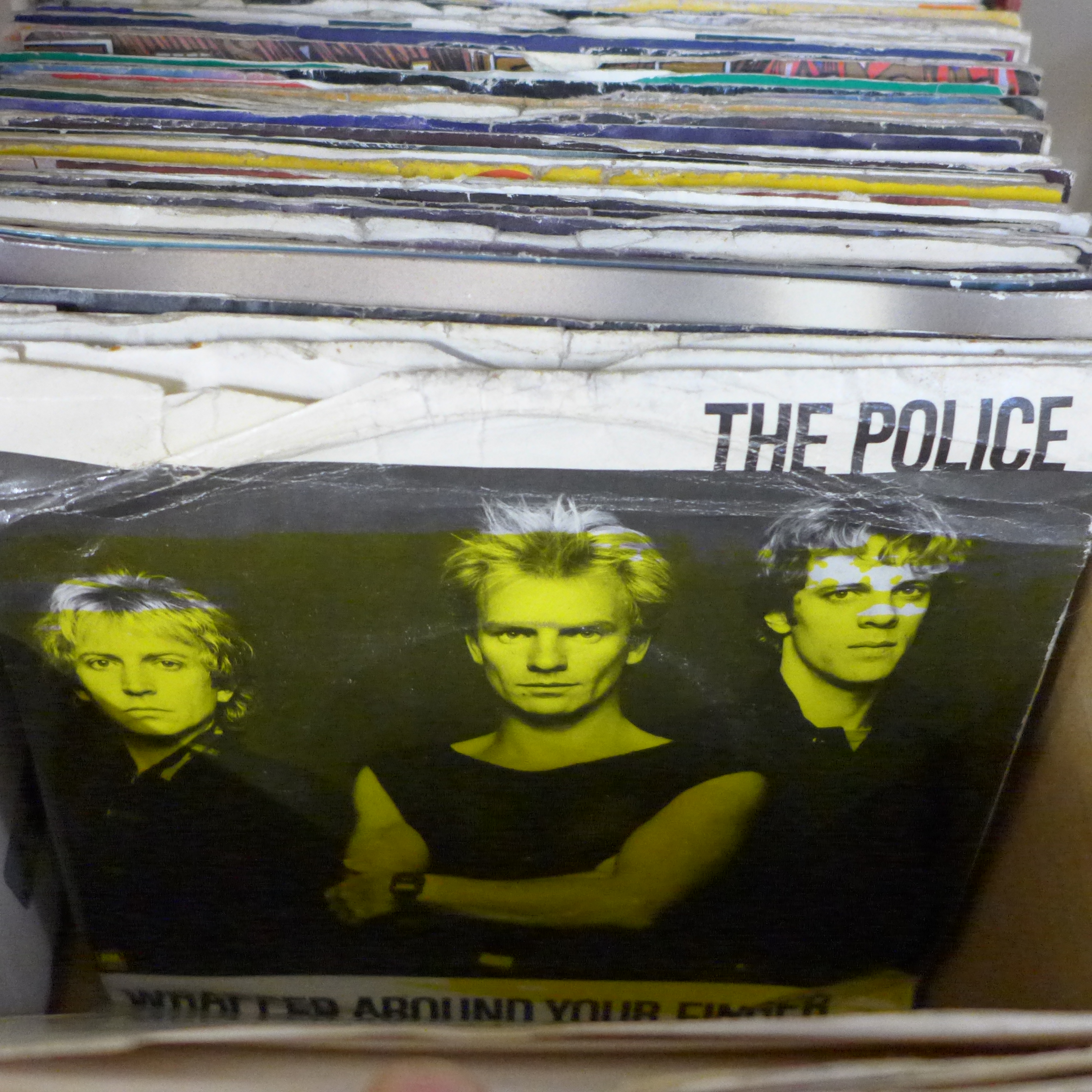 A box of 1970s/1980s 7" singles including Iron Maiden, Stranglers, David Bowie, The Pretenders, etc. - Image 5 of 7